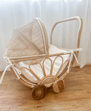 rattan play dolls pram violet side view lifestyle wooden floor handmade australia