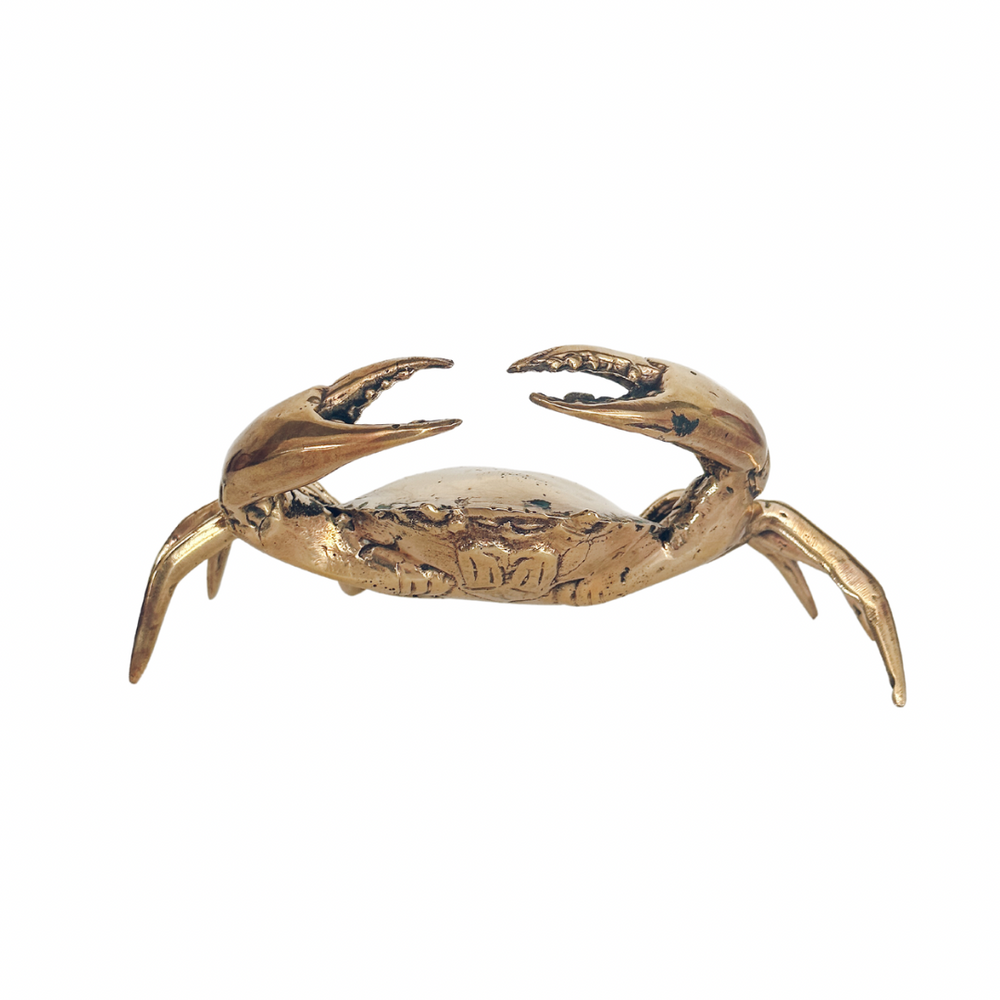 Handcrafted brass crab sculpture with luxurious gold finish - Balinese artisan home décor statement piece