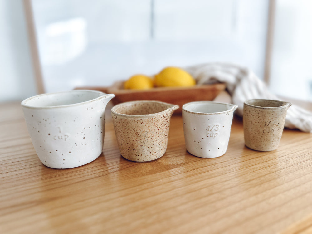 Ceramic measuring cups Francis table styling wooden bowl lemons kitchen decor