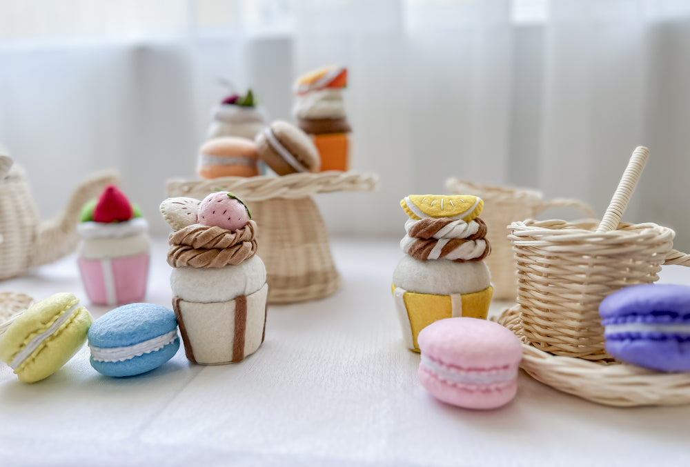 Felt macarons tea party table setting with pretend play food toys - perfect for children's imaginative tea time