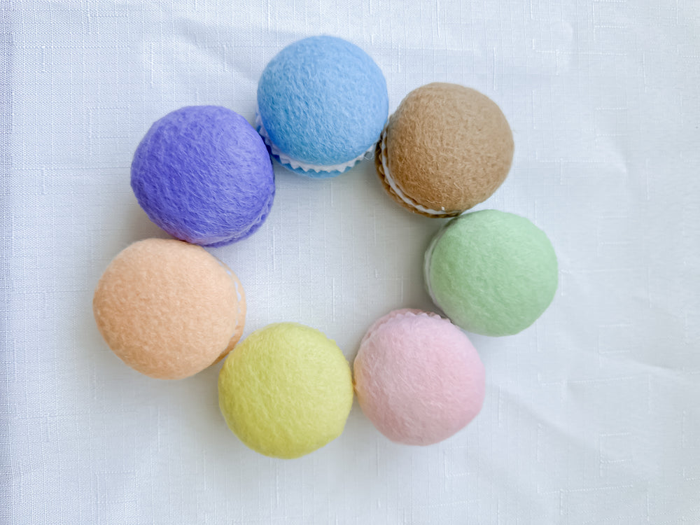 Handcrafted felt macarons in circle arrangement - colourful children's toy food for tea time imaginative play