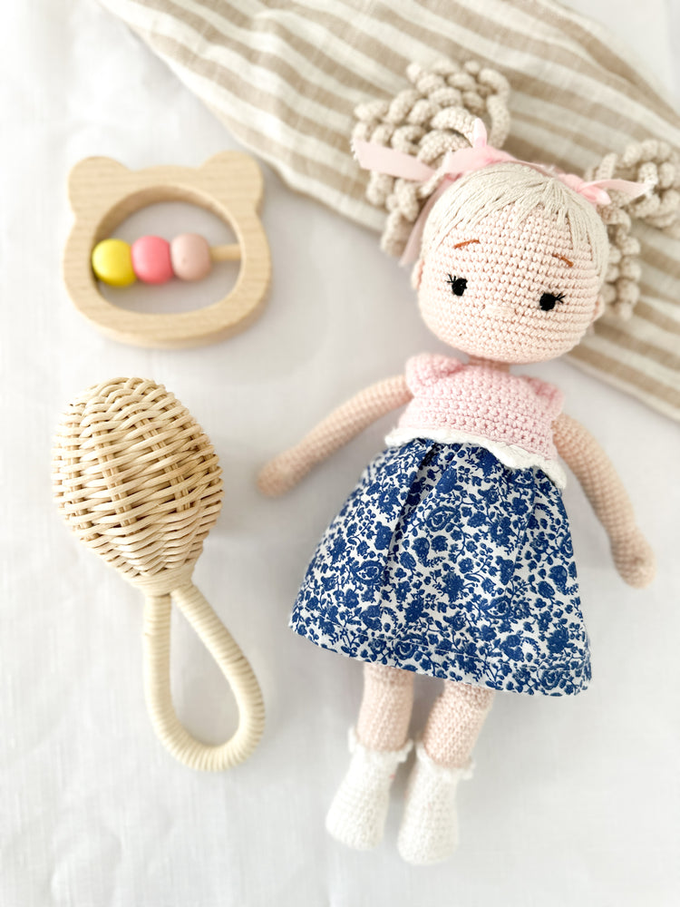 Rattan baby rattle Luella flat lay styling - natural handcrafted nursery decoration with traditional Balinese weaving