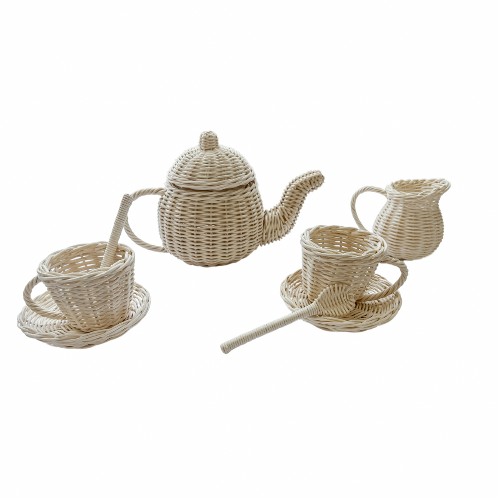 Complete handmade rattan tea set Saffron with 8 pieces on white background - Indonesian artisan children's toy including teapot, cups, saucers, spoons and milk jug for ages 3+
