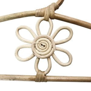 close up of handmade child's floral rattan wardrobe hanger
