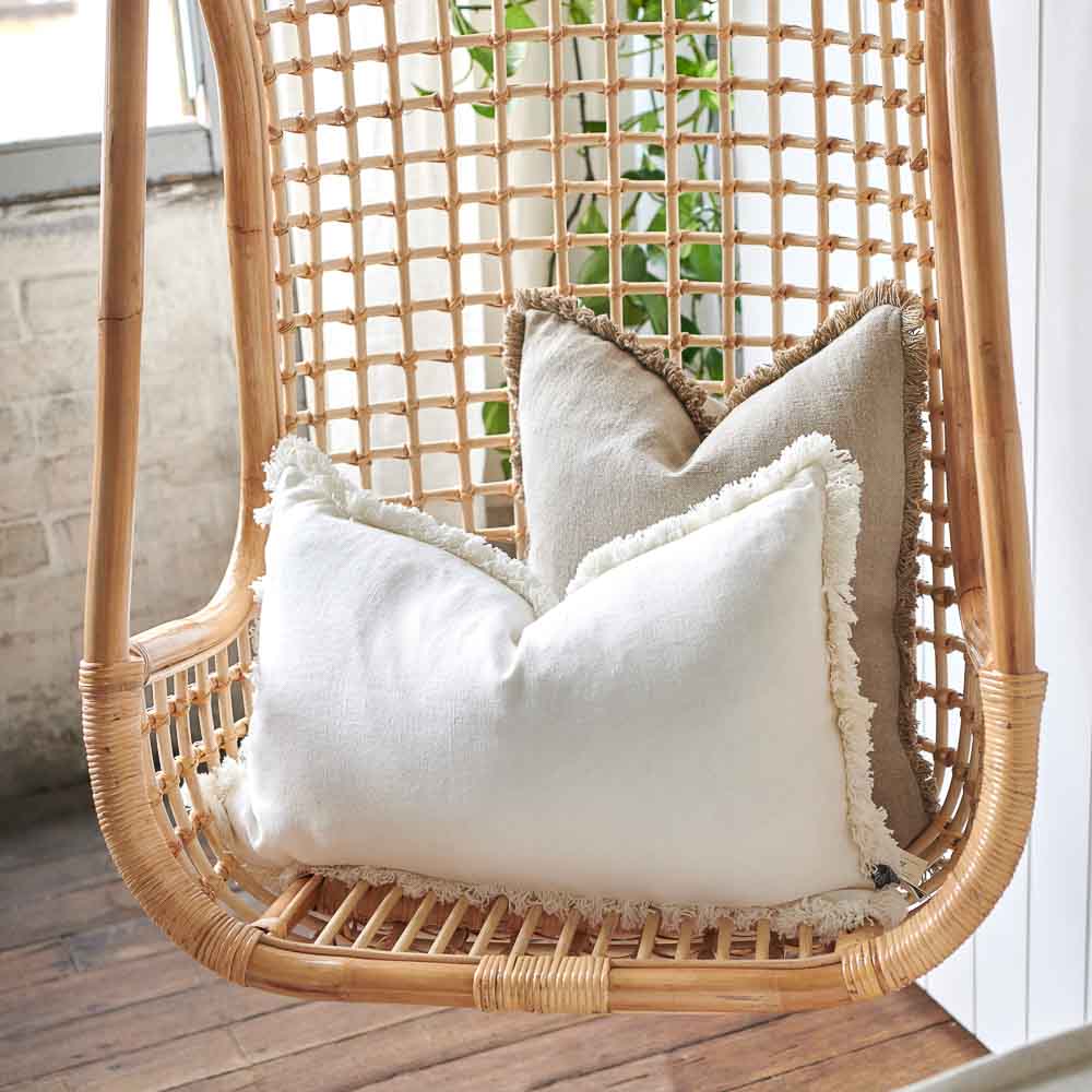 Large fringed natural linen cushion with insert on outside swing