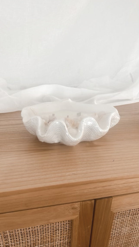 Coastal Decor Clam Shell Soy Wax Candle  displayed on unit
