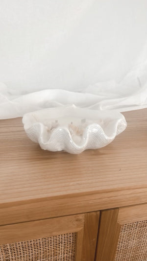 Coastal Decor Clam Shell Soy Wax Candle  displayed on unit