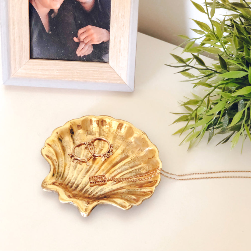 brass clam trinket dish with jewellery