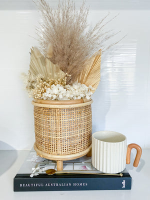 hand made rattan basket with artificial flowers