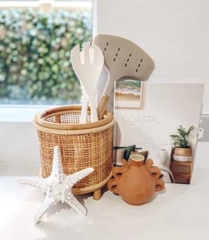 rattan basket with legs in kitchen display setting