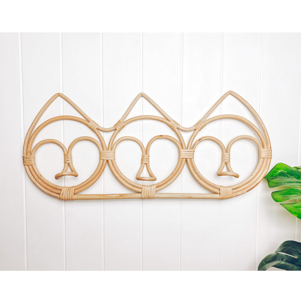 Handcrafted rattan wall hanger with three functional hooks - versatile storage solution for hats, scarves and accessories