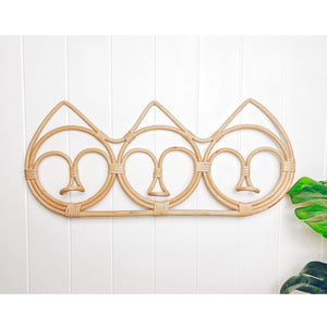 Handcrafted rattan wall hanger with three functional hooks - versatile storage solution for hats, scarves and accessories