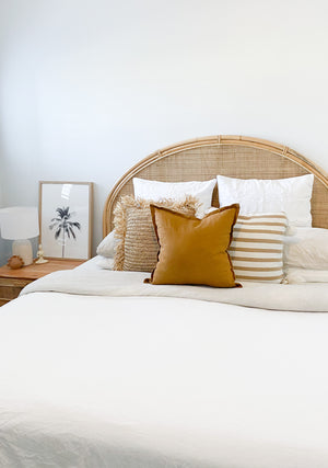 Small yoga lady at bedside with picture, Remi vase and white lamp - elegant bedroom meditation decor and peaceful styling